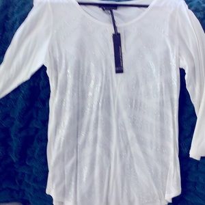 White blouse with silver embellishments